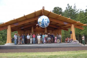 Earthball and volunteers take the stage at the dedication ceremony of the Stage on the Eastsound Village Green, summer 2006