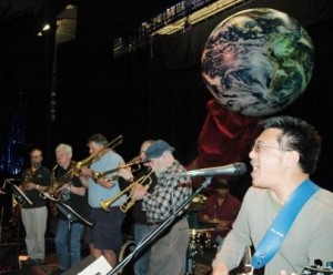 Gene Nery, in the foreground, jams with the greats of the world, at the 2008 "One World" Music Festival. This year's event is on June 19 and 20.
