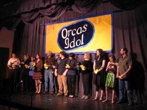 The Orcas Idol Finalists, from left, Bryan Benepe, Heather Stansbury, KT Laslo, Marissa Veldman, Carl Burger, Jared Grantham, Stephen Baker, Julia Bailey, Susan Weiss, Charly Robinson, Arianna and Jason Dean