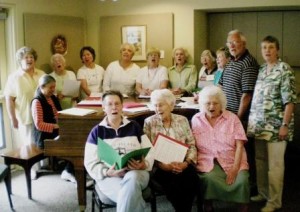 The Senior Songbirds rehearse Tuesdays at the Senior Center. From left, Mary Myer at the piano, Kay Clark, Dora Blake, Young Song, Nancy Zier, Trudy Erwin, Midge Lafland, Peggy Wareham, Joyce Greene, Jim Clark and Linda Tretheway. In front are Katie Jensen, LeaAnna Stewart and Betty Eagan. Missing are Wes Pomeroy, John Symons and John Inch. 