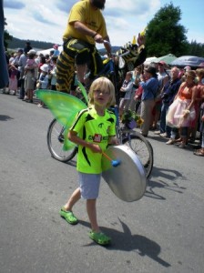 Henry Moe beats the drum down the parade route