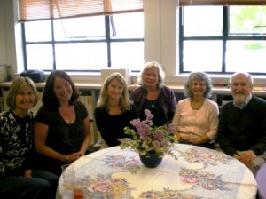 Parents Nancy O'Brien, Margie Sabine, Kathi Ciskowski, Elementary School Coundselor Moriah Armstrong, and parent Ed Wilson enjoy lilacs and tea at the luncheon planned on May 27 for school volunteers.